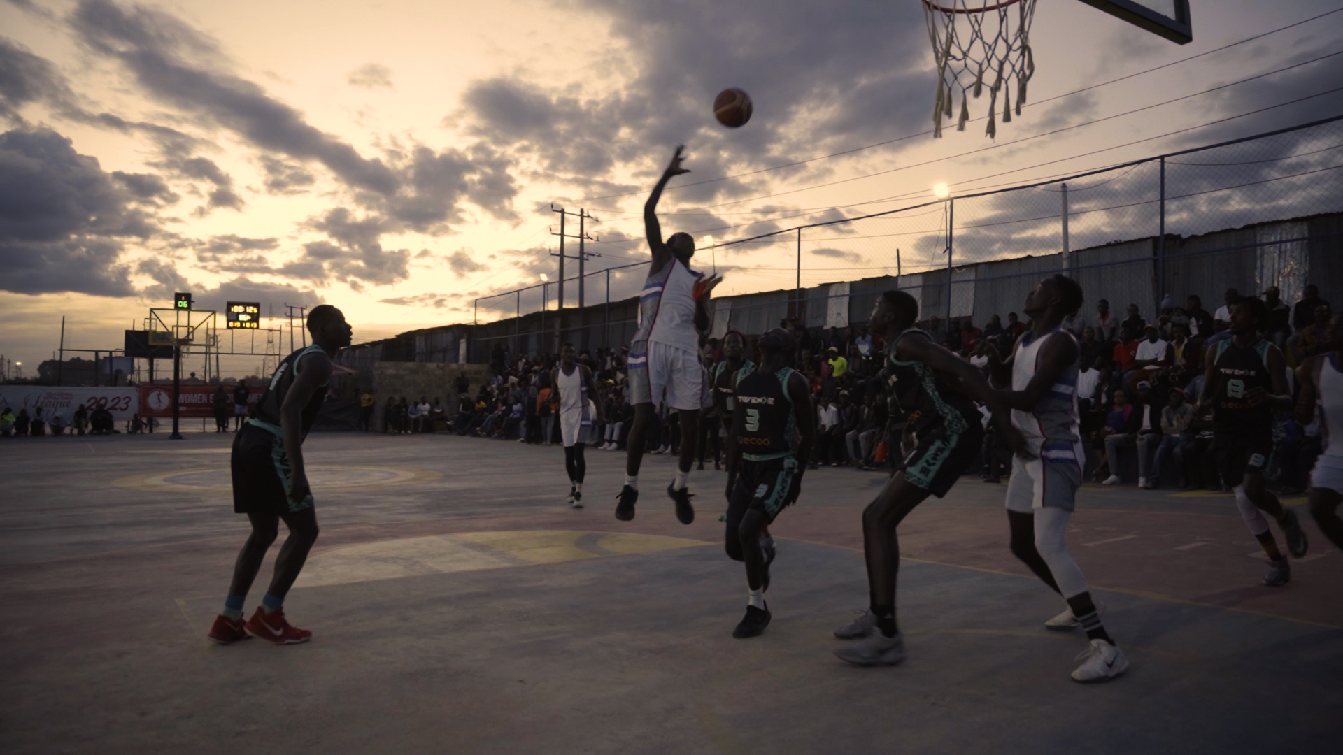 A jump shot at golden hour in Kibera
